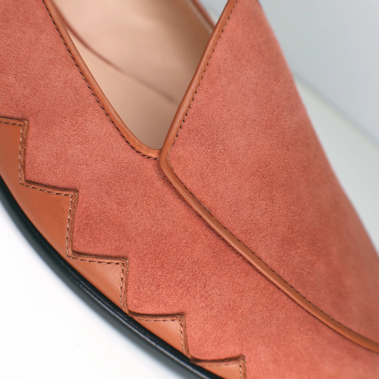 Close-up of the JB Ander Great White model smoking slipper loafer in terracotta luxury suede with premium Italian leather detail