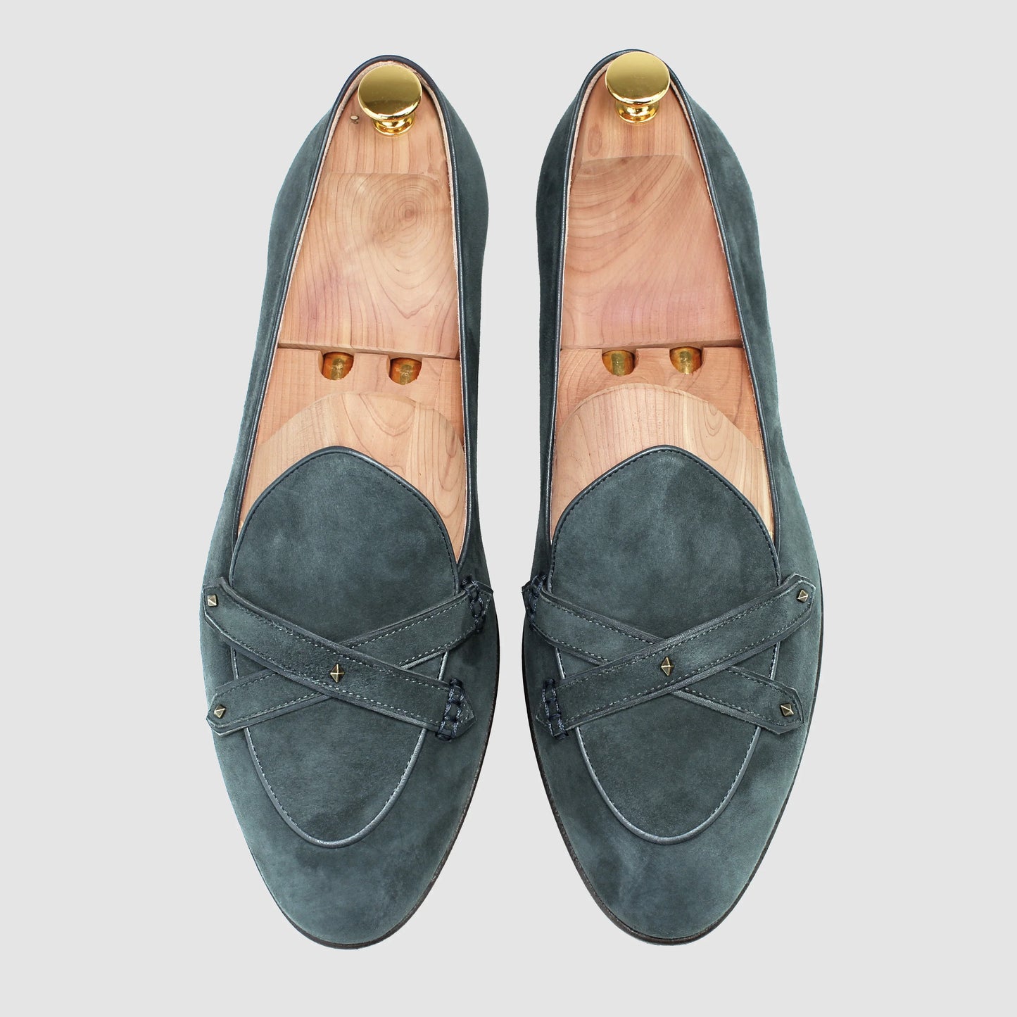 Overhead view of JB Ander men's Lincoln saddle loafers in Emerald sude with dual leather strap and handmade Italian craftsmanship.
