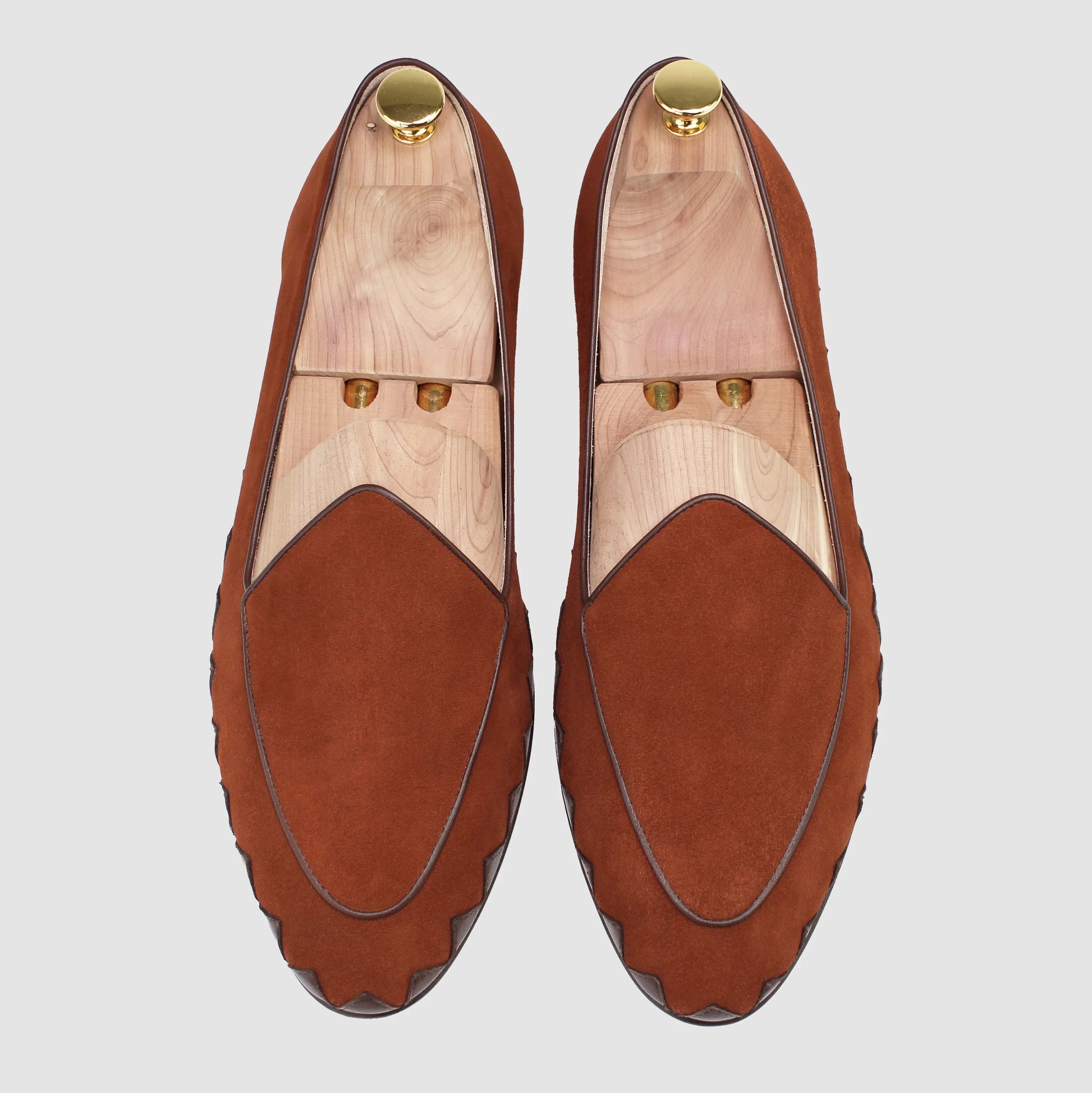 Overhead view of JB Ander men's Great White smoking slipper loafers in SoHo Sunset burnt umber suede with leather piping, and handmade Italian craftsmanship.