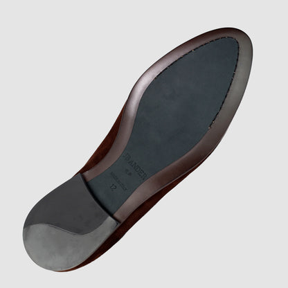 Leather sole of the JB Ander Lincoln saddle loafer in Brooklyn Brownstone brown suede, showing polished brown leather edge, 'Made in Italy' detail, and slim rubber heel for comfort and grip.