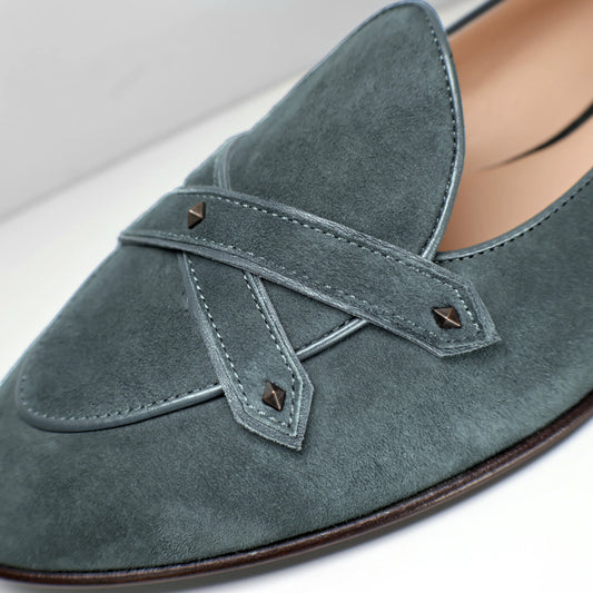 Close-up of the JB Ander Lincoln model Italian suede loafer in color Empire Emerald luxury suede with antiqued gold hardware on leather straps