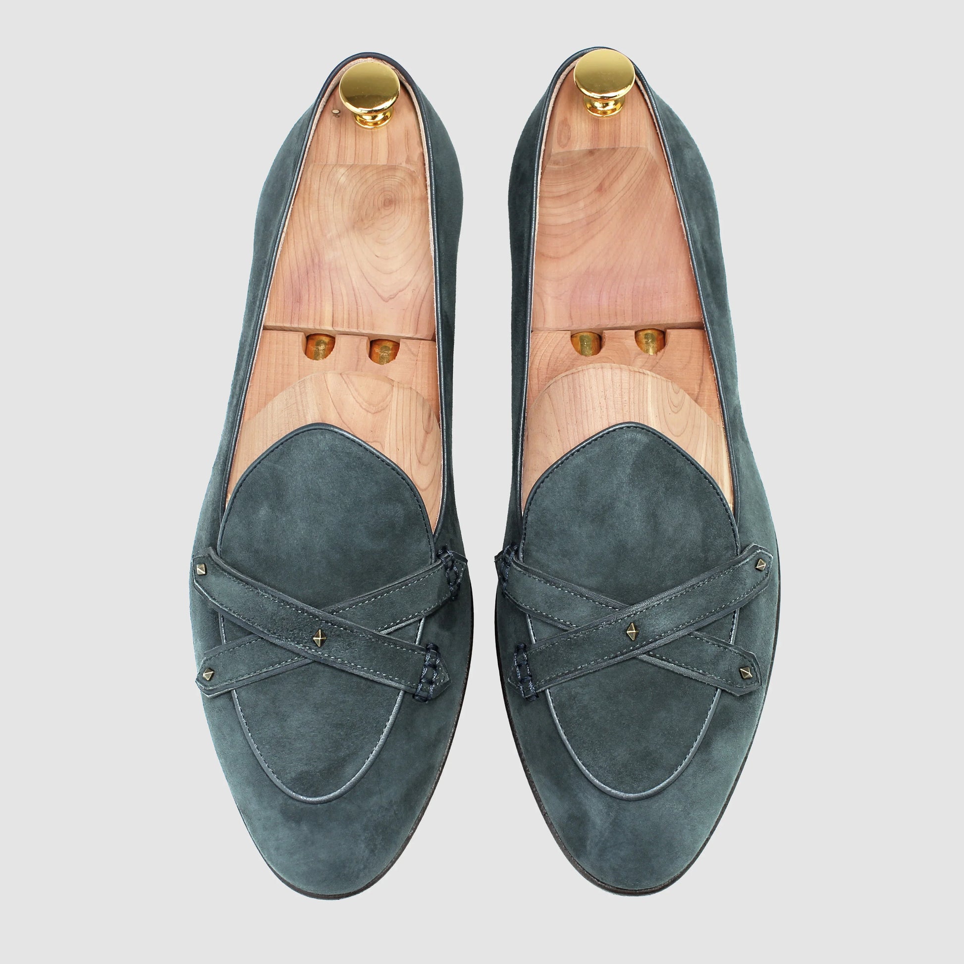 Overhead view of JB Ander men's Lincoln saddle loafers in Emerald sude with dual leather strap and handmade Italian craftsmanship.