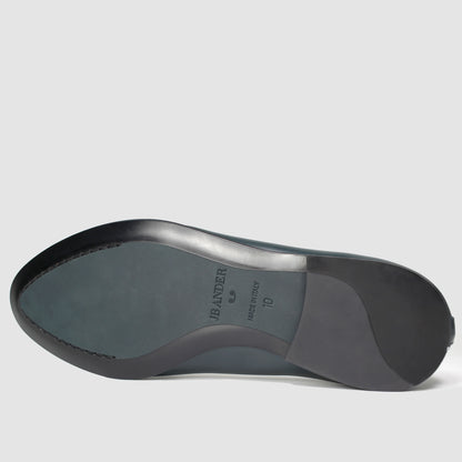 Leather sole of the JB Ander Scottie kilt loafer in Verde green leather, showing polished black leather edge, 'Made in Italy' detail, and slim rubber heel for comfort and grip.
